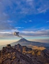 Climbing the Iztaccihuatl volcano, Popocatepetl volcano in Mexico, Tourist on the peak of high rocks. Sport and active life Royalty Free Stock Photo