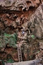 Climbing a ladder in the Grand Canyon Royalty Free Stock Photo