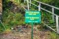 Climbing ladders at Mount Muhabura in the Mgahinga Gorilla National Park, w