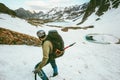 Climbing Man with big backpack and ice axe mountaineering Royalty Free Stock Photo