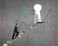 Climbing on money stairs with business concept doodles on wall Royalty Free Stock Photo