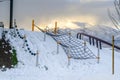 Climbing net on a snowy playground in Utah