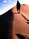 Climbing a sand dune in colorado Royalty Free Stock Photo