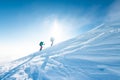 climbers climb to the top of the mountain in winter Royalty Free Stock Photo