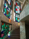 Climbing stairs along a large stained glass window Royalty Free Stock Photo