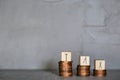 Climbing stairs with coins and wooden cubes wih the word TAX,money and Tax Concept background with Copy space. Royalty Free Stock Photo