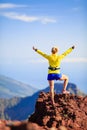 Climbing success, woman cross country runner