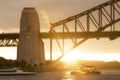 Climbing the Sydney Harbour Bridge at sunset Royalty Free Stock Photo