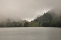 Climbing the volcano Semeru, Indonesia. Clouds obscured the crater and green valley Royalty Free Stock Photo