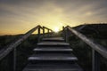 Climbing wooden stairs on Sylt island dunes Royalty Free Stock Photo