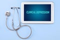 Clinical depression text on the tablet screen Royalty Free Stock Photo