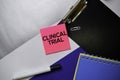 Clinical Trial text on sticky notes with color office desk concept