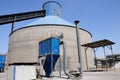 Clinker storage silo with a dust collector Royalty Free Stock Photo