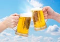 Clinking Beer glasses. Royalty Free Stock Photo