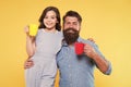 Clinking cups. Water balance and health care. Family drinking tea. Bearded man and happy girl holding mugs. Father and Royalty Free Stock Photo
