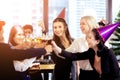 Clinking Glasses of Champagne or Wine. Group of Business People Celebrating New Year at Office party Royalty Free Stock Photo