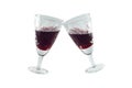 Clinking vintage crystal glasses with red wine isolated Royalty Free Stock Photo