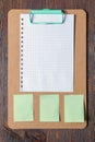 Clip board with blank paper and notes Royalty Free Stock Photo