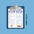 Clipboard with balance sheet and pen. Royalty Free Stock Photo