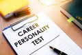 Clipboard with Career personality test on an desk. Assessments concept.