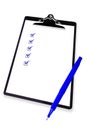 Clipboard with Checklist and Blue Pen Royalty Free Stock Photo