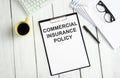 Clipboard with Commercial insurance policy Royalty Free Stock Photo