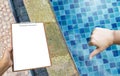 Clipboard in girl hand over Damage swimming pool edge from acid water Royalty Free Stock Photo