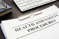 Clipboard with health and safety procedures Royalty Free Stock Photo