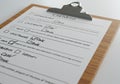 A clipboard holds a printed checklist with several checkboxes and unintelligible text, Royalty Free Stock Photo