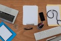 Clipboard with keyboard and mouse on table Royalty Free Stock Photo