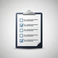 A clipboard with a metal clip holds a checklist featuring five checkboxes and horizont Royalty Free Stock Photo