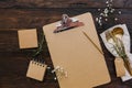 Clipboard mock up with vintage cutlery and wedding flowers. Planning concept.