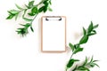 Clipboard mockup with border frame made of ruscus branches