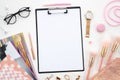 Clipboard mockup.Composition with cosmetics, makeup tools, on the table. beauty, fashion, blog and shopping concept Royalty Free Stock Photo