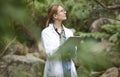 Clipboard, nature and scientist woman in agriculture research, sustainability and checklist of climate change test Royalty Free Stock Photo