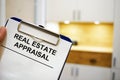Clipboard with Real estate appraisal. Royalty Free Stock Photo
