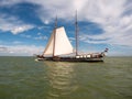 Clipper and brown fleet charter ship sailing on IJsselmeer lake, Netherlands