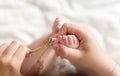 clipping nails in a small child