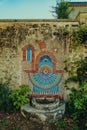 Ancient water tap in Clisson city in the vineyard near Nantes city, Bretagne, France. Italian-style typical architecture, reminisc