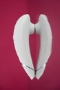 Clitoral vibrator on mirrored pink surface. Royalty Free Stock Photo
