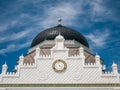 Clock with Arabic Number in Baiturrahman Grand Mosque Banda Aceh, Indonesia Royalty Free Stock Photo