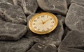 Clock on a background of beautiful stones