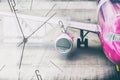 Clock on the background of the plane at the airport. Double exposure. Travel time. Travel concept Royalty Free Stock Photo