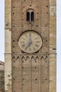 The clock in the bell tower of the cathedral in Parma, Italy, strikes seven o`clock