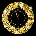 Clock on a black background with gold spangles