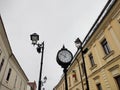 Clock and buildings in Baia Mare city, Romania Royalty Free Stock Photo