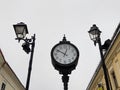 Clock and buildings in Baia Mare city, Romania Royalty Free Stock Photo