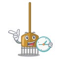 With clock cartoon rake leaves with wooden stick Royalty Free Stock Photo