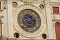 Clock dell`Orologio on St Mark`s Square San Marc in Venice, Italy. Detail with clock face and astrological Zodiac signs