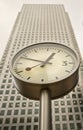 Clock detail in front of Skyscraper